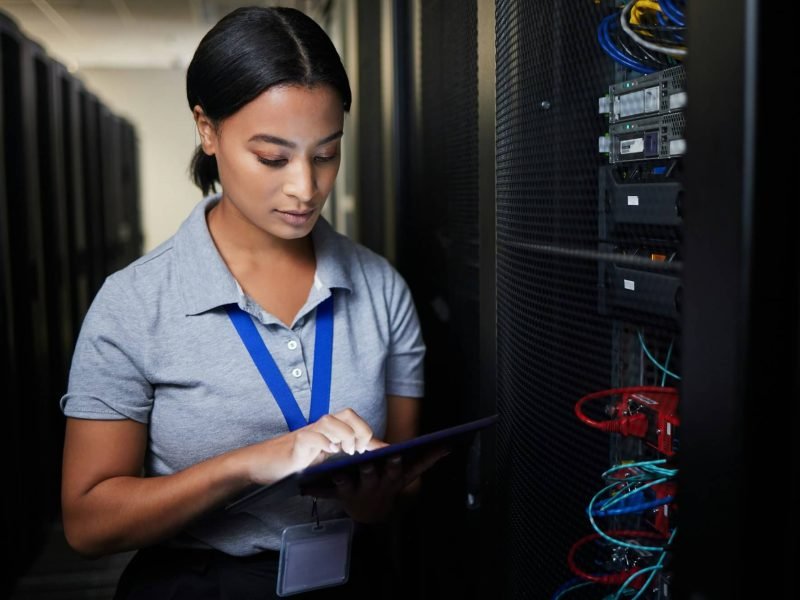 woman-tablet-and-server-room-programming-or-coding-for-cybersecurity-information-technology-or-d.jpg